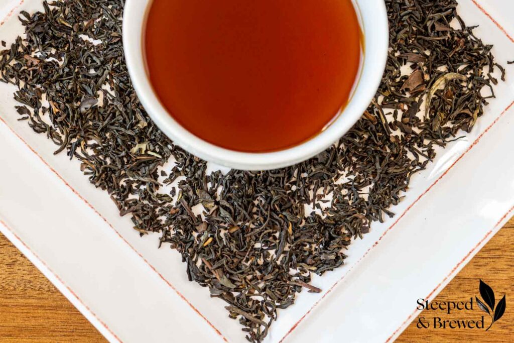 Earl Grey tea leaves and brewed tea