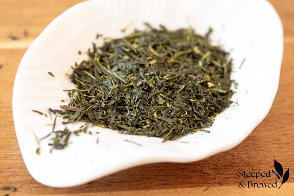 Sencha green tea leaves in a dish