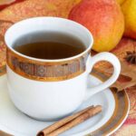 A cup of tea with autumn decor